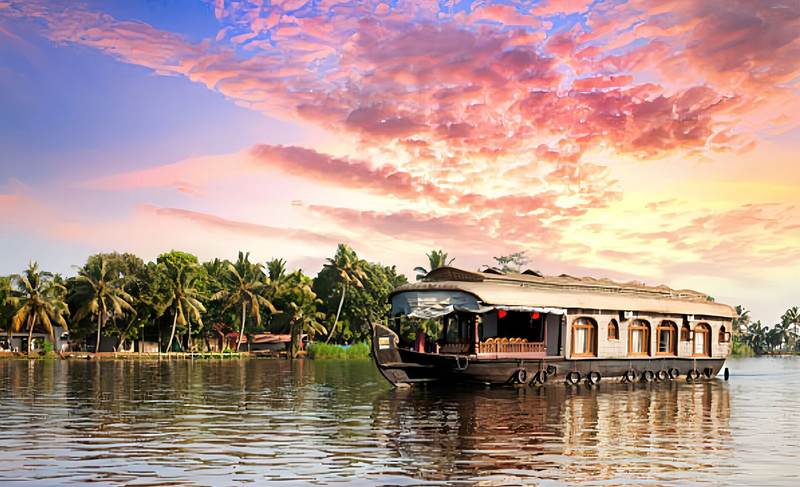 Houseboat on the Kerala backwaters at sunset